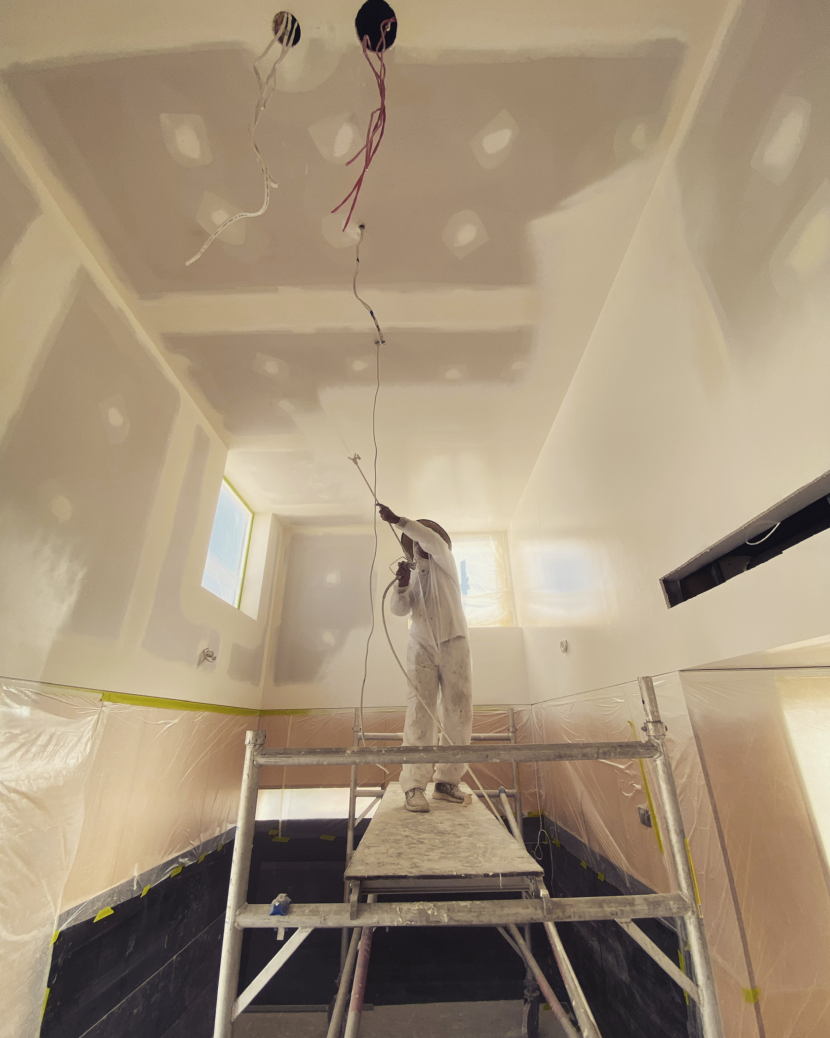 ProLux painter at work on a premium interior